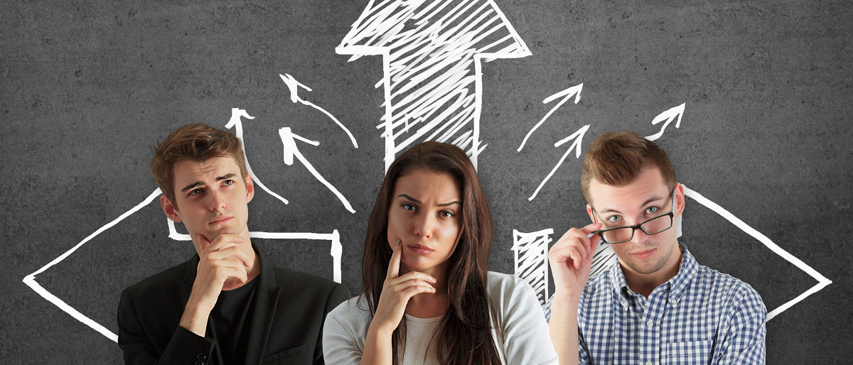 Pensive businessmen and woman standing on concrete background with drawn arrows. Way concept Schlagwort(e): arrows